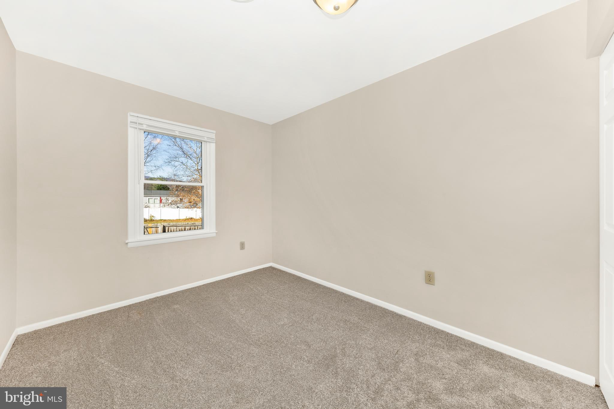 167 Stonegate Drive Frederick, MD 21702 - Photo 27 of 48 an empty room with a window
