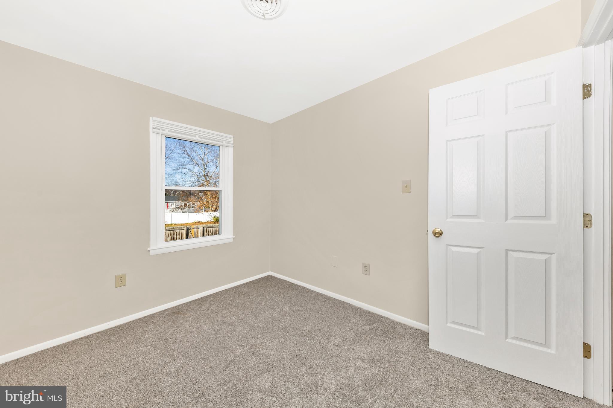 167 Stonegate Drive Frederick, MD 21702 - Photo 32 of 48 an empty room with windows