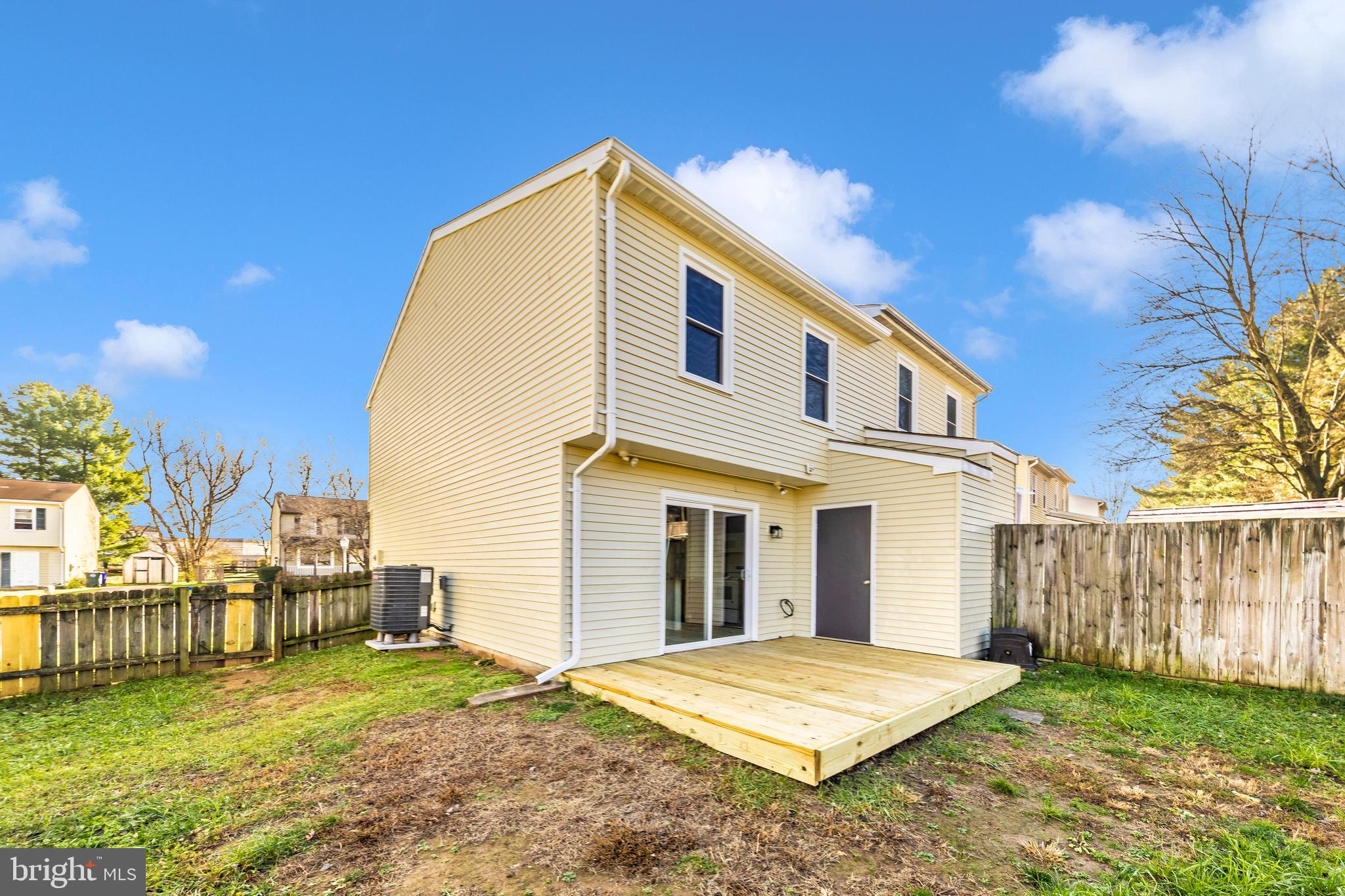 167 Stonegate Drive Frederick, MD 21702 - Photo 42 of 48 a big house with a big yard and large trees