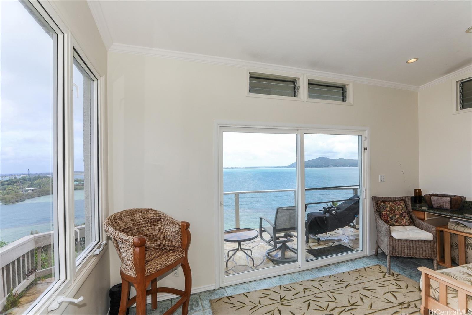 45-001 Lilipuna Road, Unit B Kaneohe, HI 96744 - Photo 13 of 22 a work room with furniture and large windows