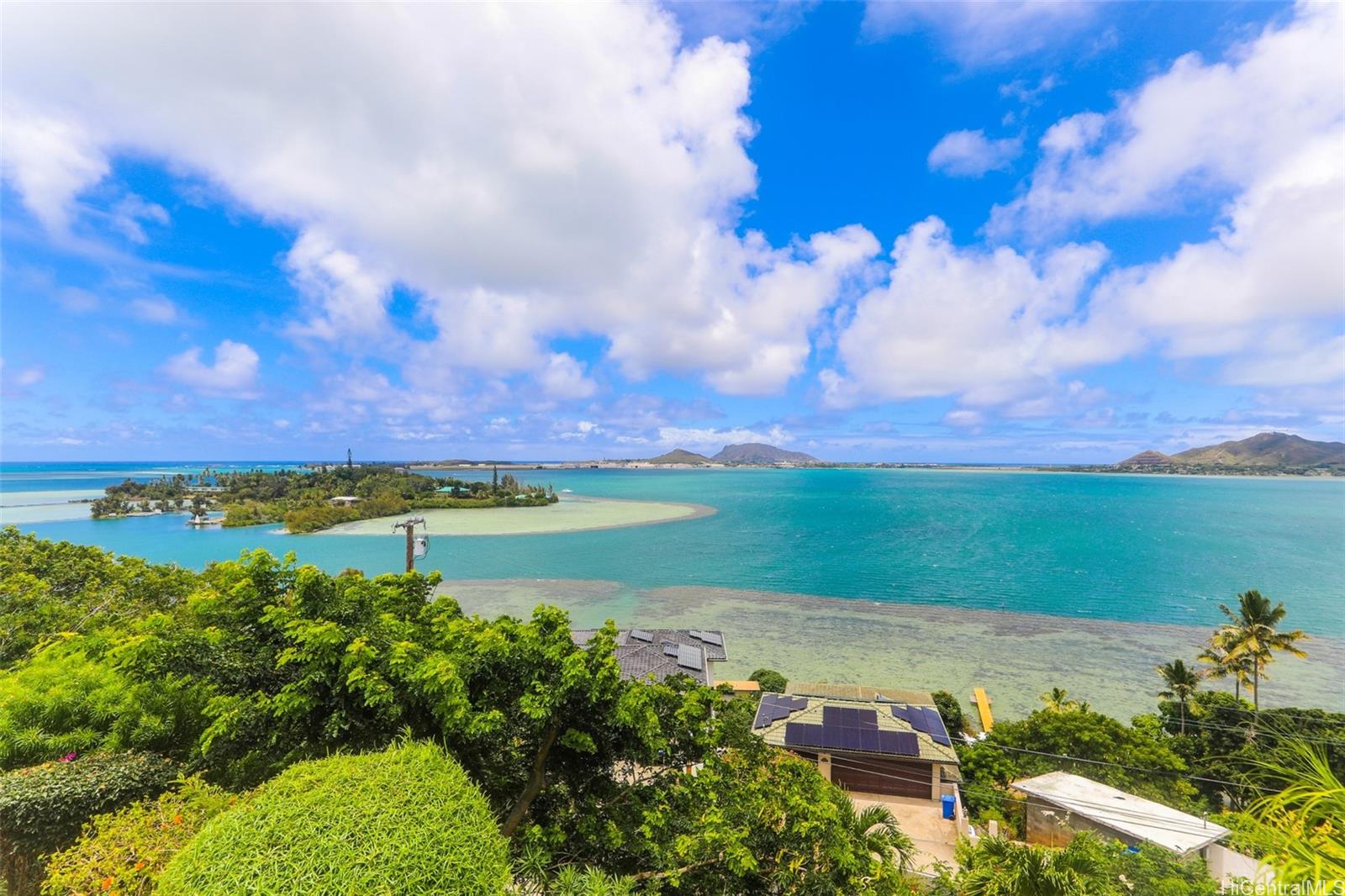 45-001 Lilipuna Road, Unit B Kaneohe, HI 96744 - Photo 4 of 22 a view of a lake with a building in the background