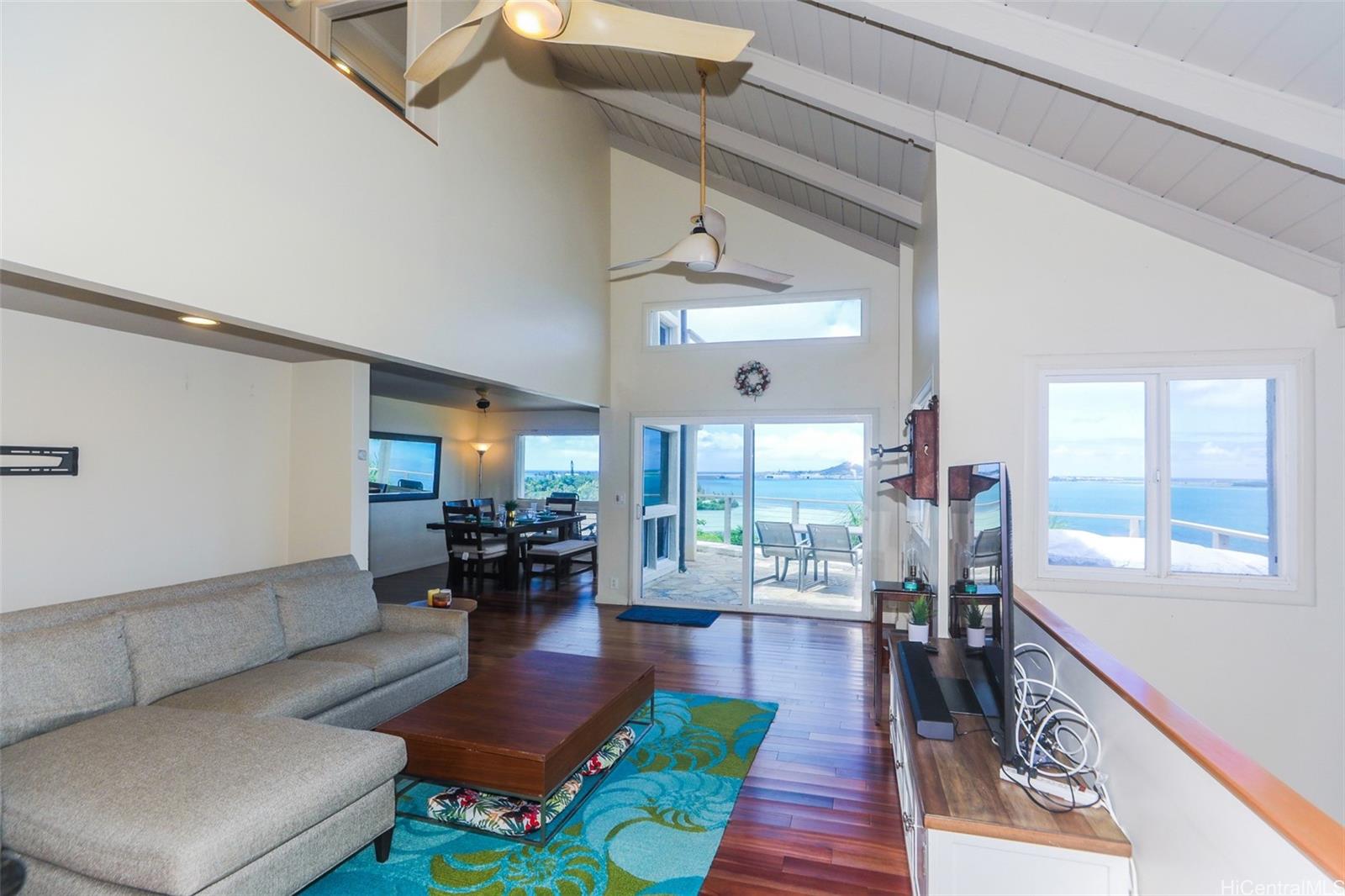 45-001 Lilipuna Road, Unit B Kaneohe, HI 96744 - Photo 5 of 22 a living room with furniture and a wooden floor