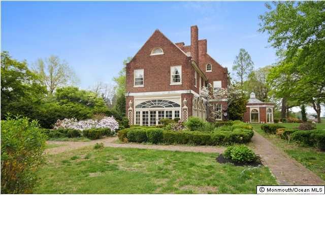 500 Navesink River Road Middletown, NJ 07701 - Photo 3 of 3 a front view of a house with a yard