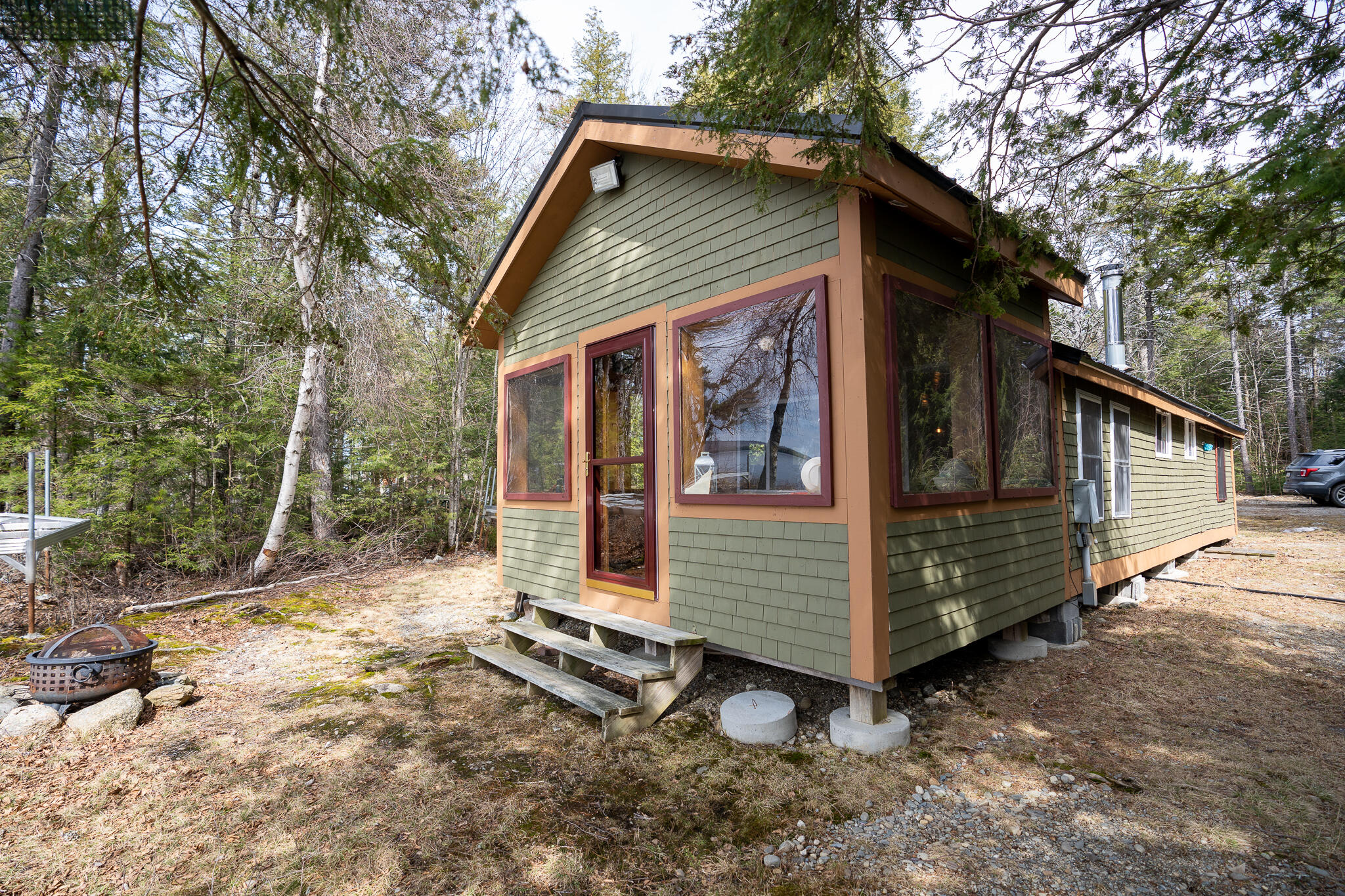 67 Sandy Shore Road Burlington, ME 04417 - Photo 4 of 24 3. Exterior Lake Side