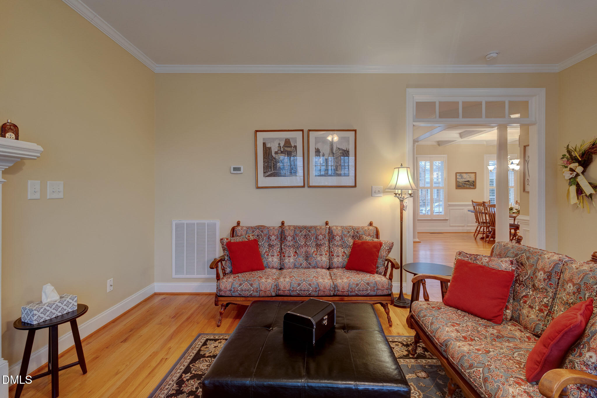 1116 Neuse Ridge Drive Clayton, NC 27527 - Photo 9 of 39 a living room with furniture and a wooden floor