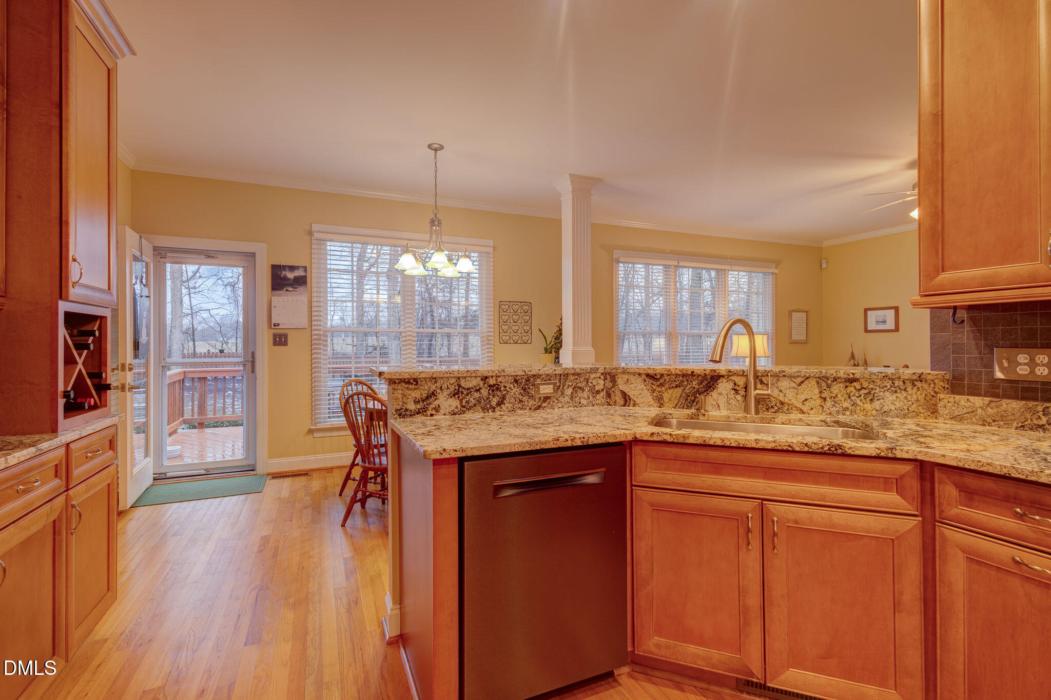 1116 Neuse Ridge Drive Clayton, NC 27527 - Photo 16 of 39 a kitchen with a sink and cabinets