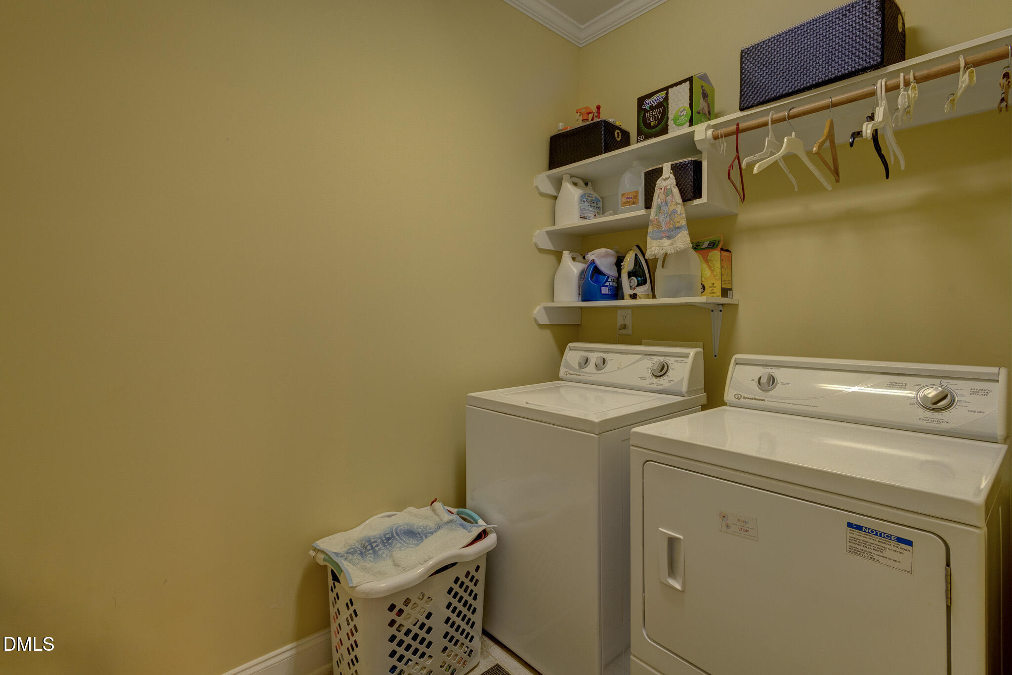1116 Neuse Ridge Drive Clayton, NC 27527 - Photo 21 of 39 a utility room with dryer and washer