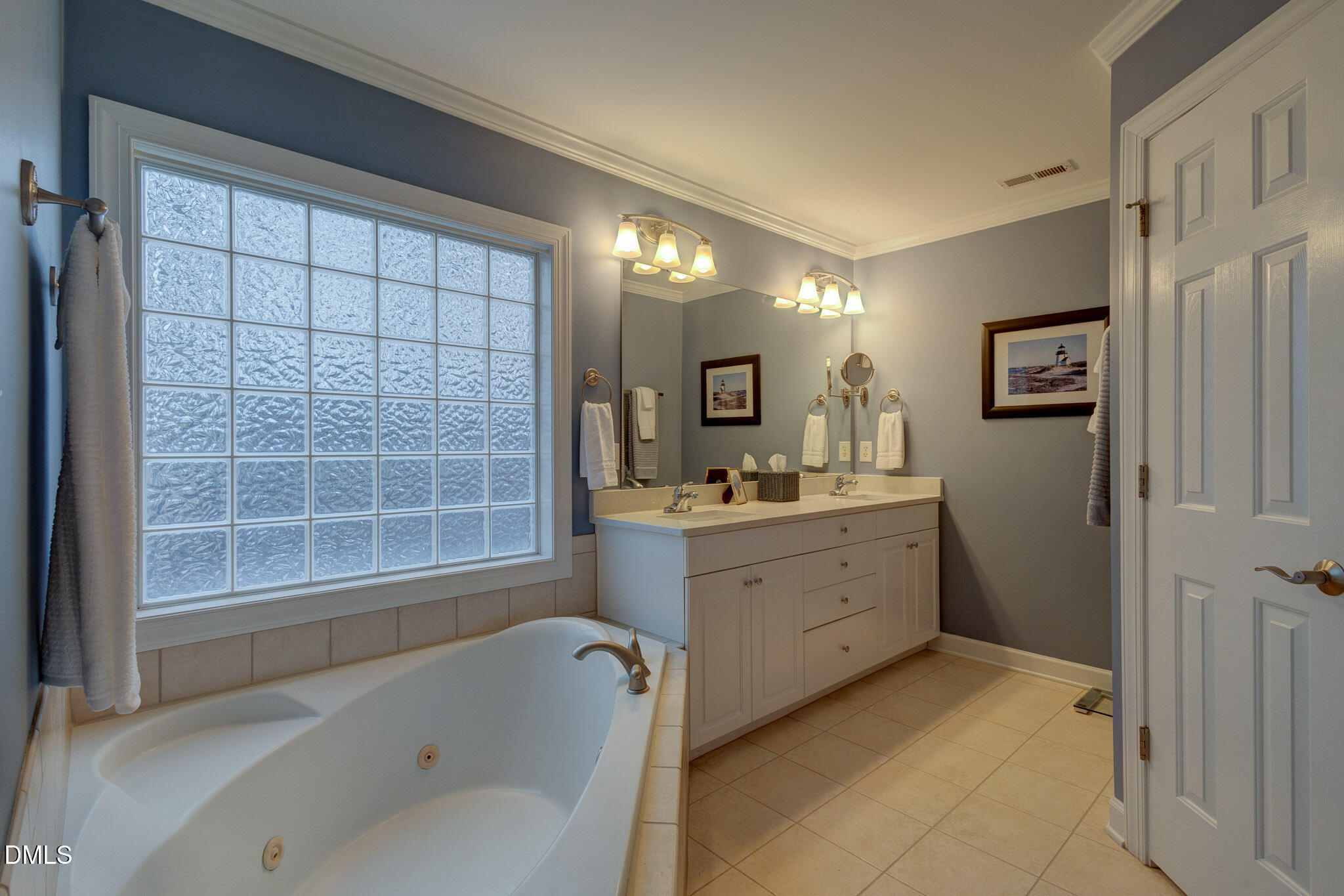 1116 Neuse Ridge Drive Clayton, NC 27527 - Photo 29 of 39 a bathroom with a tub sink shower and mirror