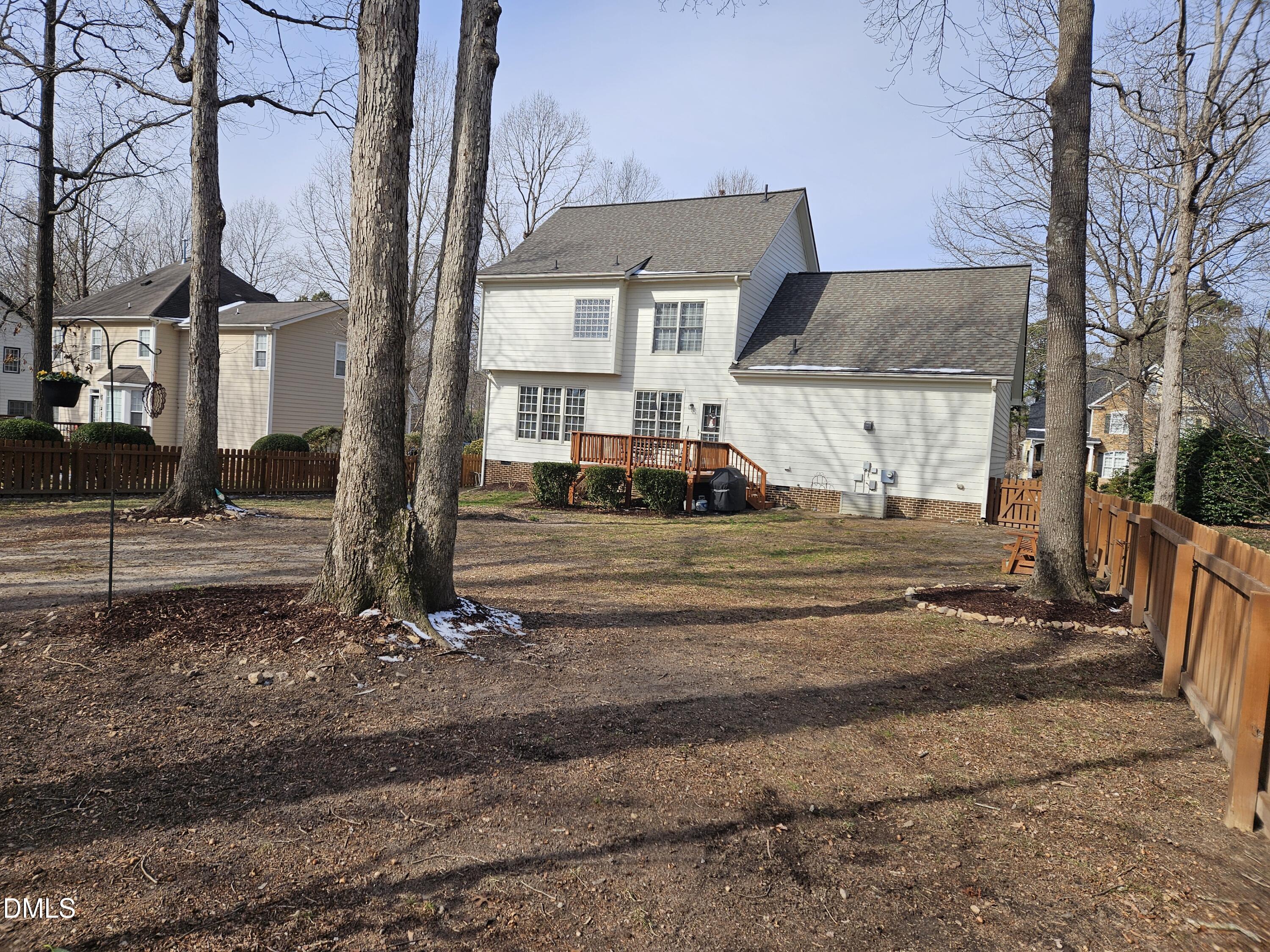 1116 Neuse Ridge Drive Clayton, NC 27527 - Photo 3 of 39 a front view of a house with a yard