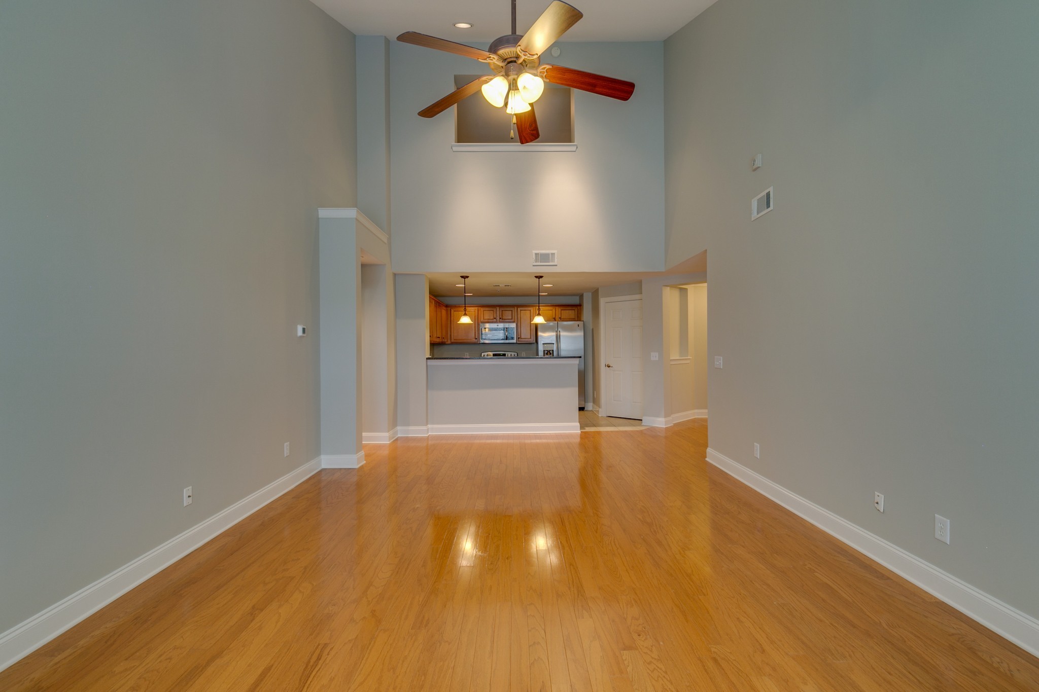 3201 Aspen Grove Drive, Unit B9 Franklin, TN 37067 - Photo 14 of 37 a view of an empty room and chandelier fan
