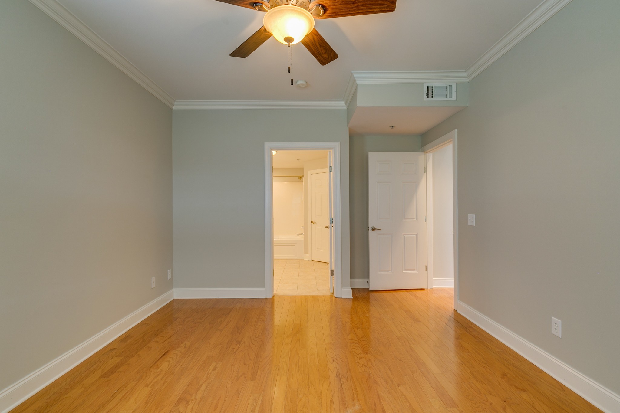 3201 Aspen Grove Drive, Unit B9 Franklin, TN 37067 - Photo 27 of 37 a view of empty room with wooden floor and fan