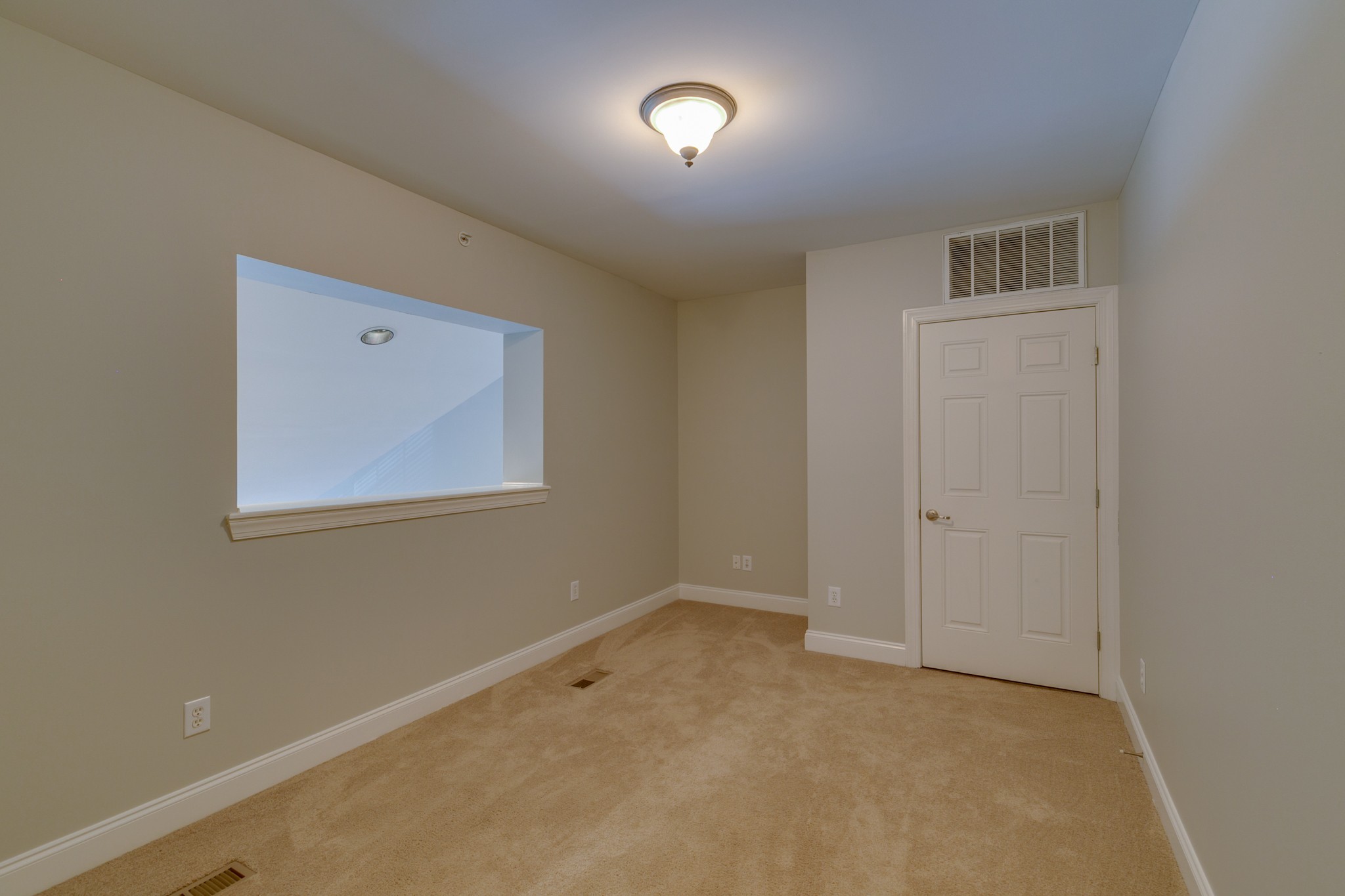 3201 Aspen Grove Drive, Unit B9 Franklin, TN 37067 - Photo 30 of 37 a view of an empty room with a window