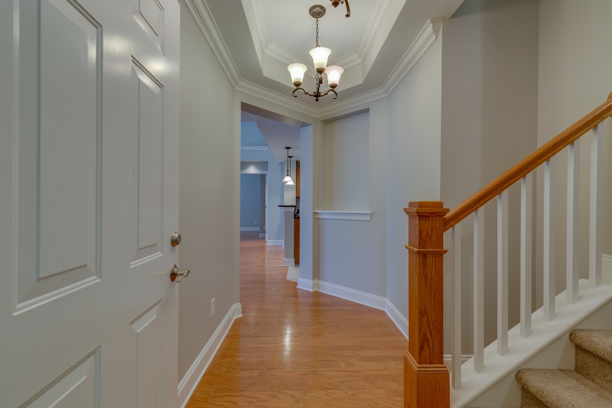 3201 Aspen Grove Drive, Unit B9 Franklin, TN 37067 - Photo 9 of 37 a view of a hallway with a chandelier