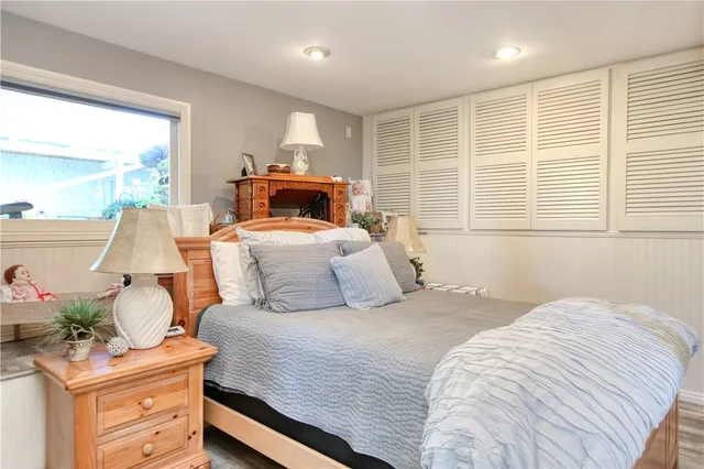 a bed room with a bed and a window