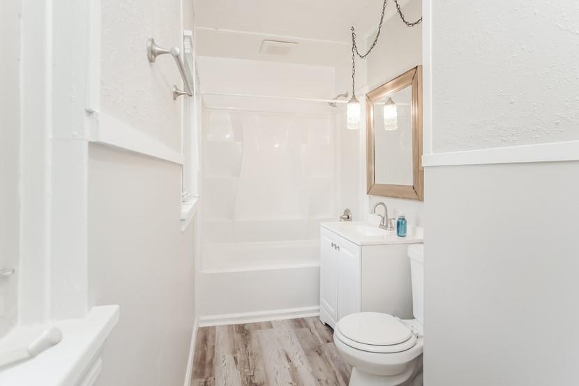 260 Ohio Street Monroeville, PA 15146 - Photo 11 of 13 a bathroom with a sink a toilet and shower