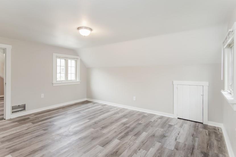 260 Ohio Street Monroeville, PA 15146 - Photo 8 of 13 an empty room with wooden floor and windows