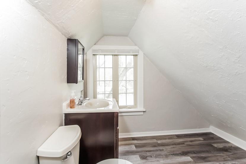 260 Ohio Street Monroeville, PA 15146 - Photo 9 of 13 a bathroom with a sink mirror and toilet