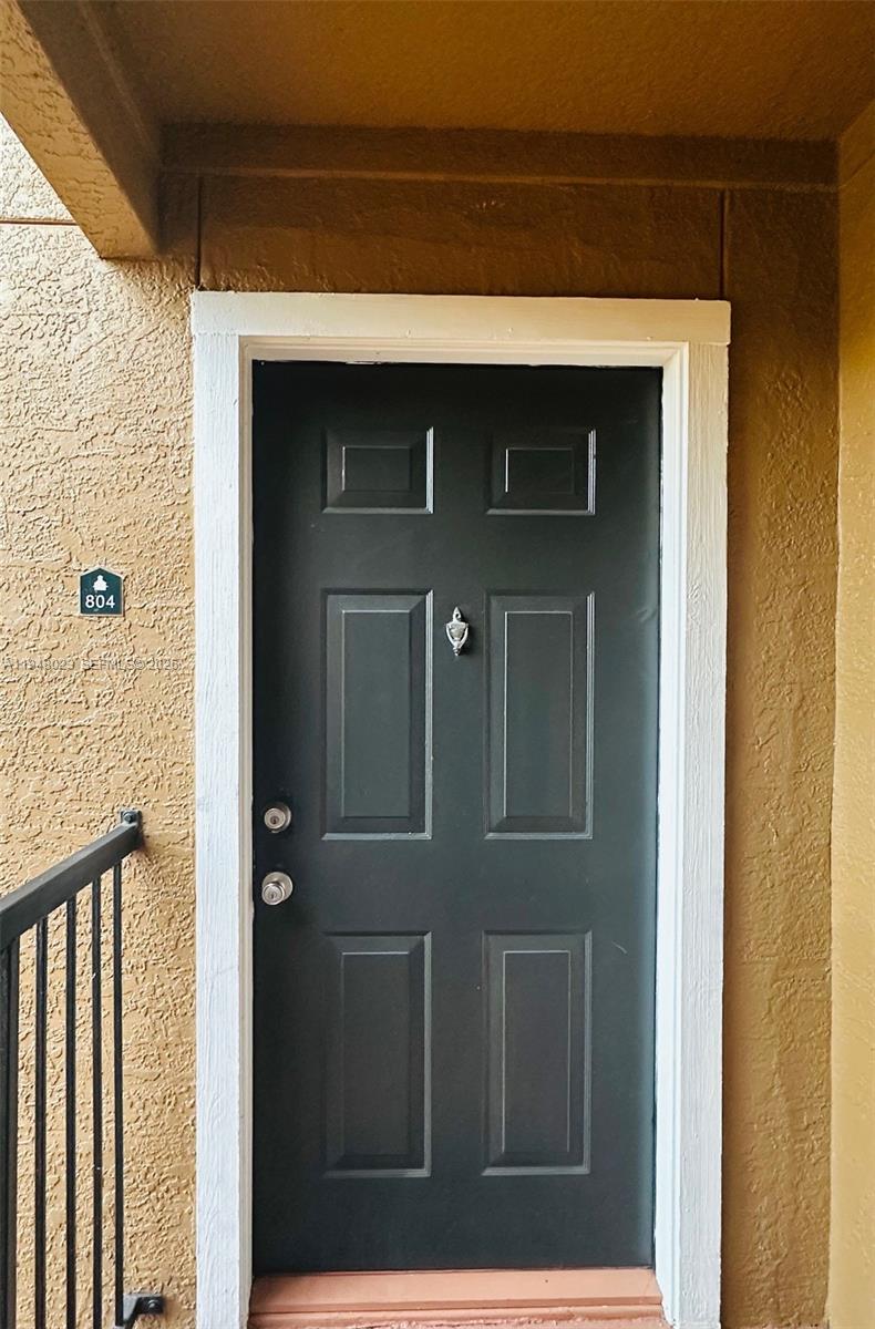 15680 Southwest 106th Lane, Unit 804 Miami, FL 33196 - Photo 12 of 32 a front view of a house