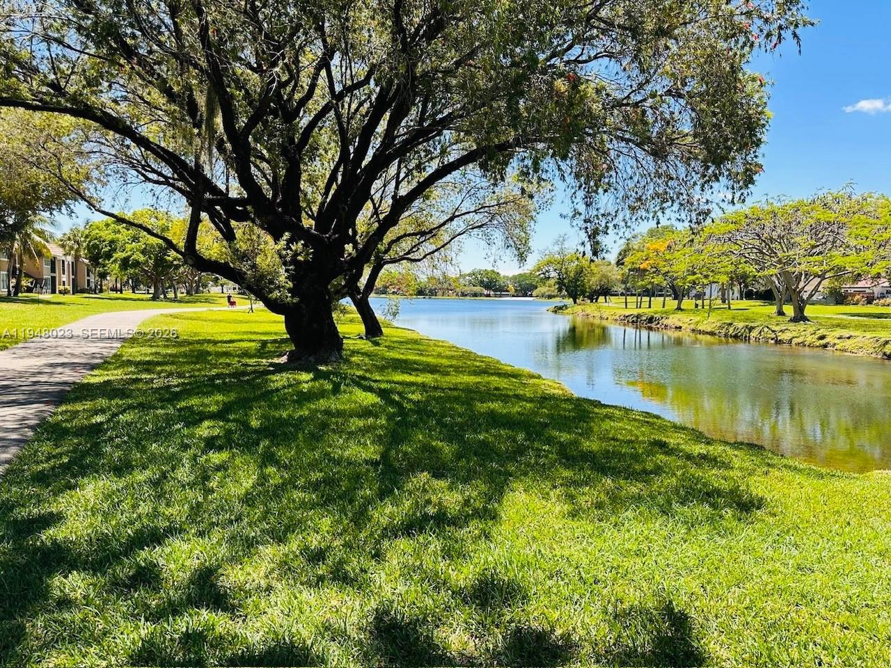 15680 Southwest 106th Lane, Unit 804 Miami, FL 33196 - Photo 30 of 32 a view of lake view