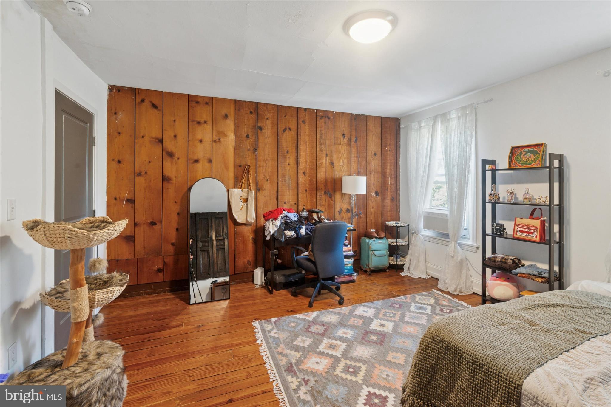 3816 Spring Garden Street Philadelphia, PA 19104 - Photo 20 of 30 a bedroom with furniture and a window