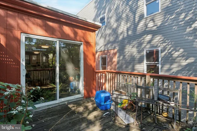 a view of a two chairs in the balcony