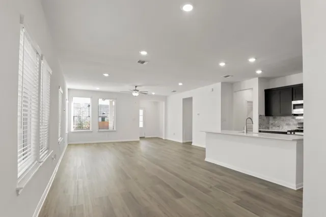 a view of large windows in a kitchen