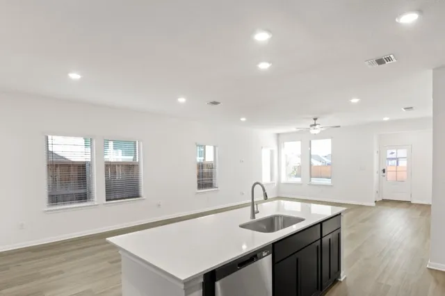 a view of a swimming pool with a table and chairs