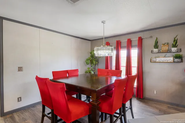 a view of a dining room with furniture