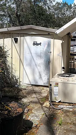 a view of a back yard of a house