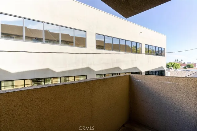 a swimming pool with outdoor seating and yard