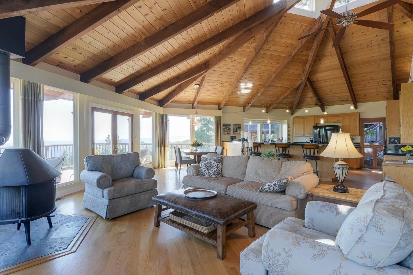 18503 Favre Ridge Road Los Gatos, CA 95033 - Photo 13 of 40 a living room with furniture and a large window