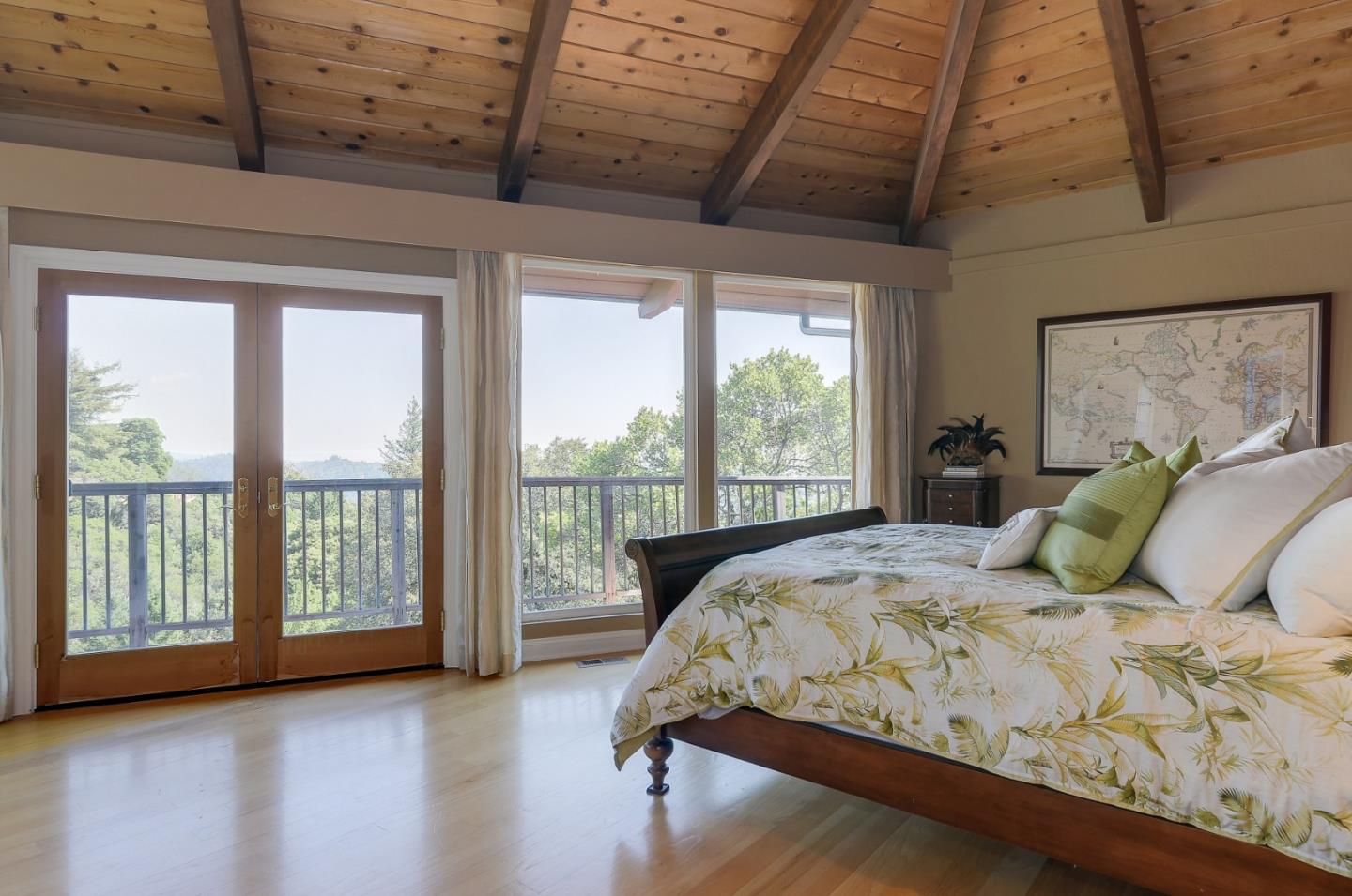18503 Favre Ridge Road Los Gatos, CA 95033 - Photo 25 of 40 a bedroom with a large bed and a large window