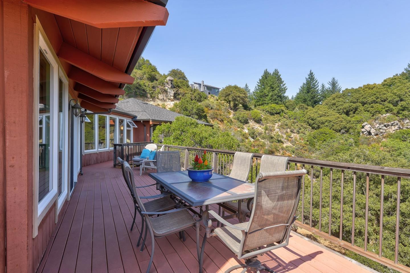 18503 Favre Ridge Road Los Gatos, CA 95033 - Photo 29 of 40 a view of a balcony with furniture and wooden floor