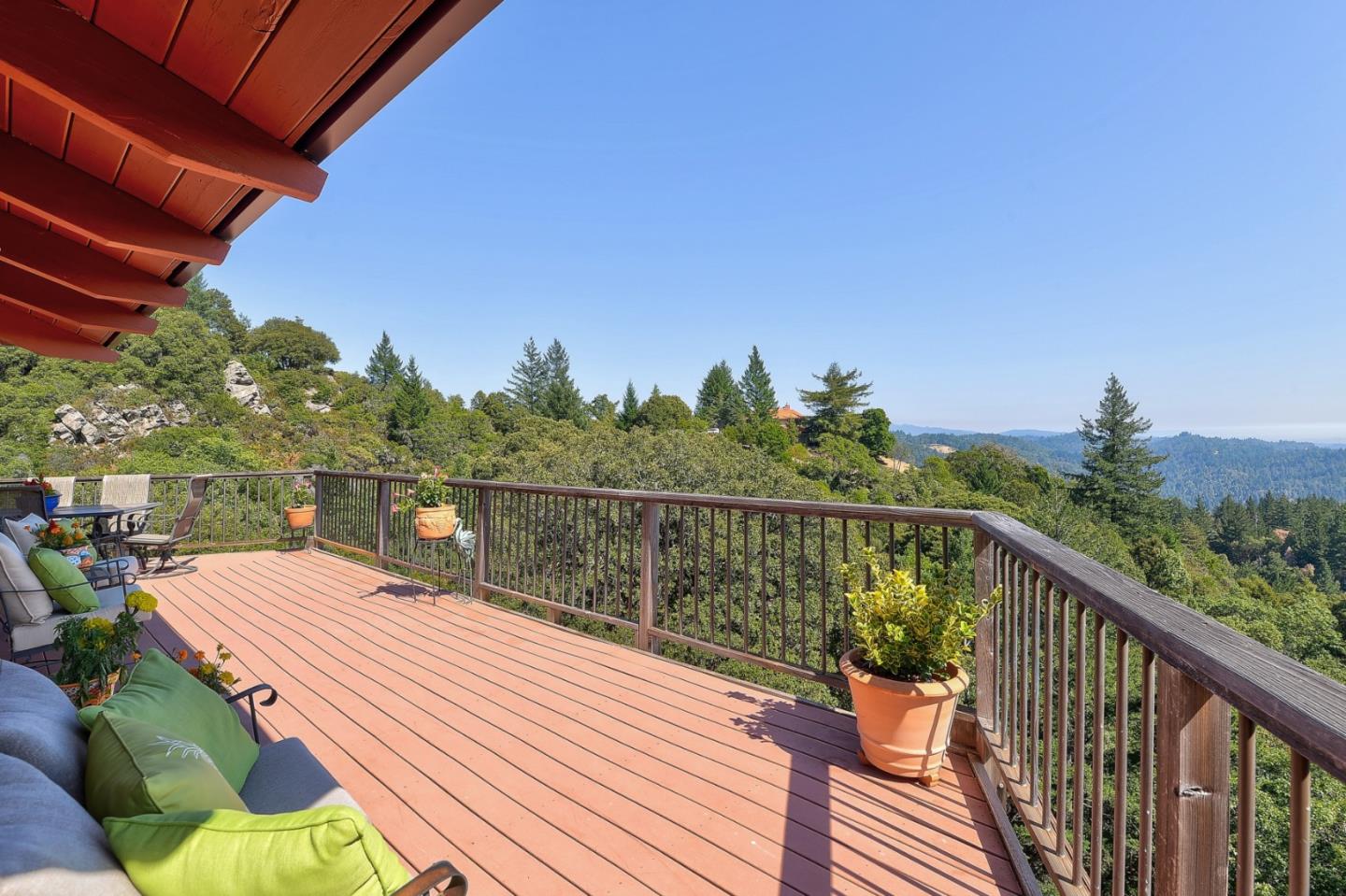 18503 Favre Ridge Road Los Gatos, CA 95033 - Photo 30 of 40 a balcony with wooden floor and city view