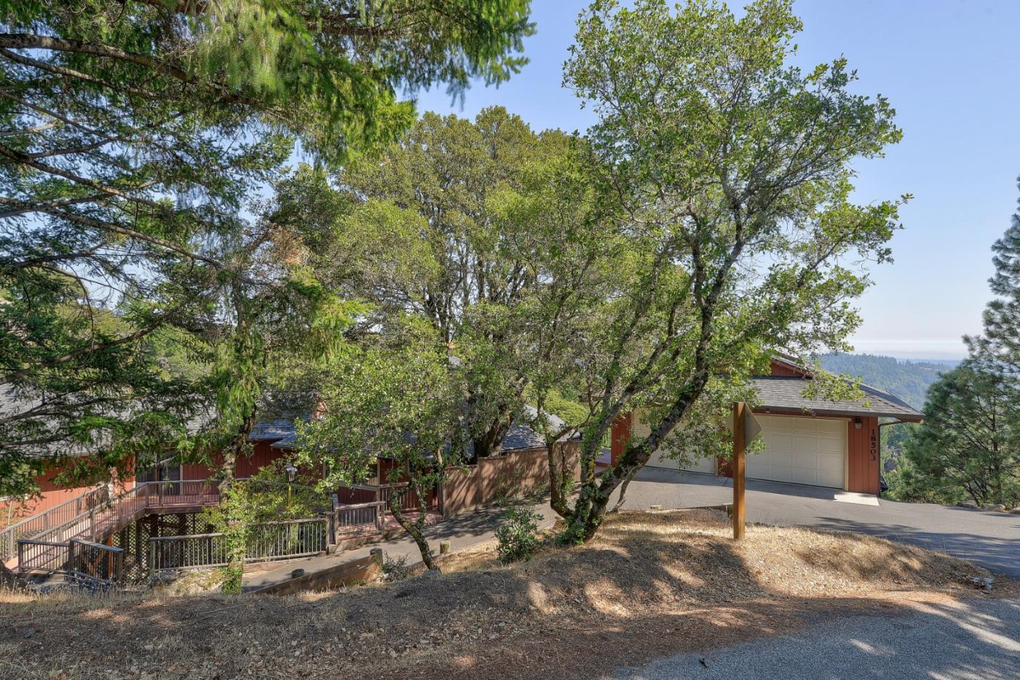 18503 Favre Ridge Road Los Gatos, CA 95033 - Photo 6 of 40 a view of a house with a tree