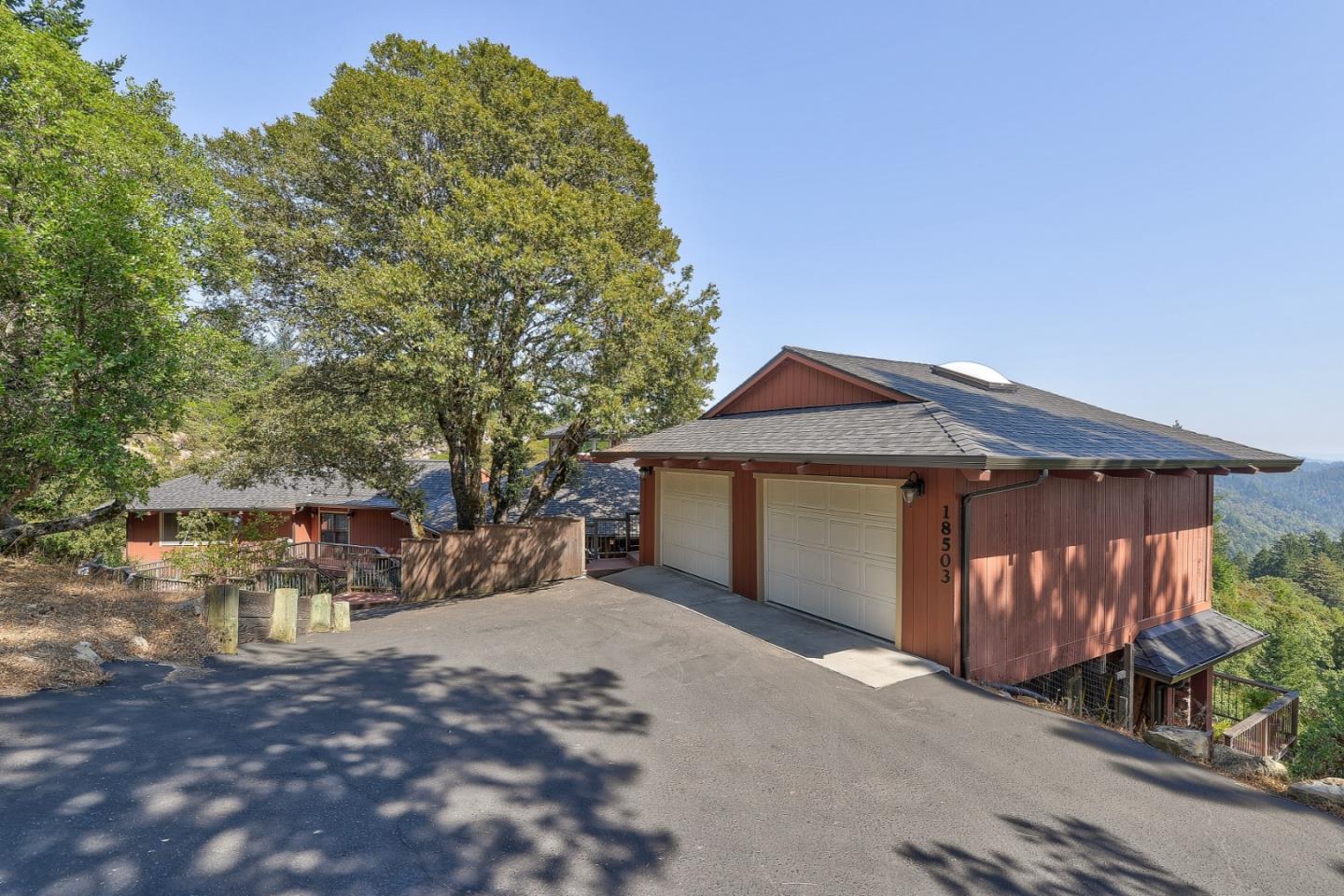 18503 Favre Ridge Road Los Gatos, CA 95033 - Photo 10 of 40 a view of a house with a yard
