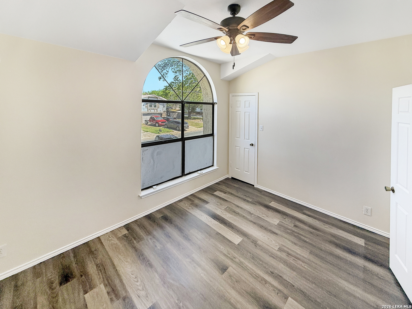 9808 Delta Ridge Drive Converse, TX 78109 - Photo 17 of 38 an empty room with windows and ceiling fan