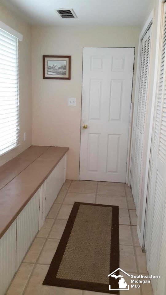 33 East Substation Road Temperance, MI 48182 - Photo 7 of 11 Back Entry With Storage
