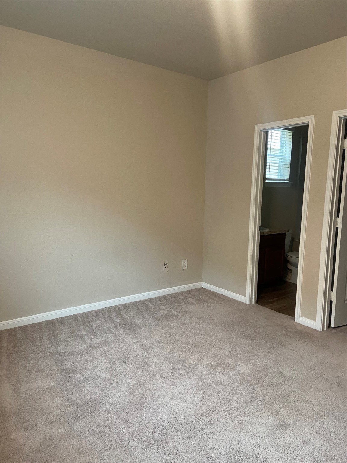 18614 Cooper Ravine Way Katy, TX 77449 - Photo 8 of 9 an empty room with windows