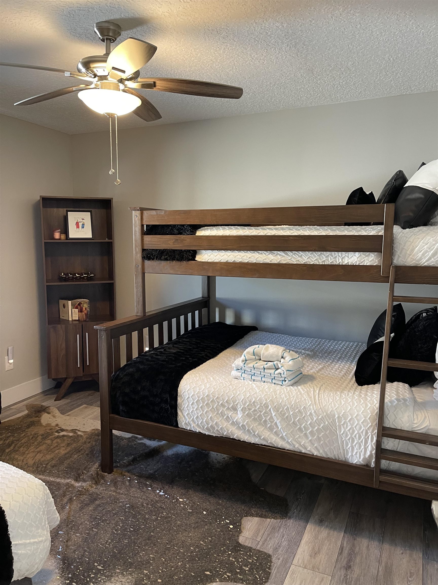 18 Comares Avenue St. Augustine, FL 32080 - Photo 12 of 18 a bedroom with a bed and a chandelier