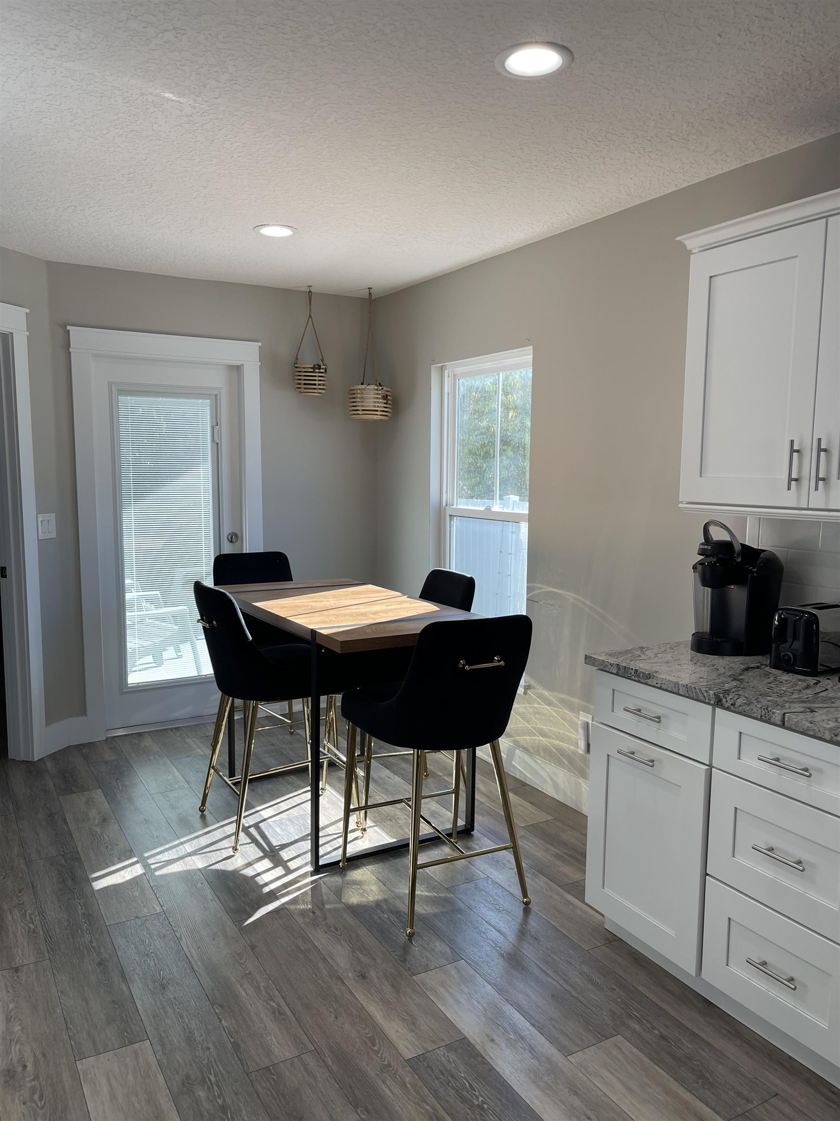 18 Comares Avenue St. Augustine, FL 32080 - Photo 15 of 18 a kitchen with a table and chairs in it