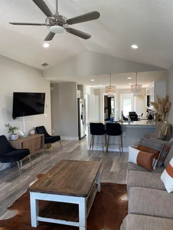 a kitchen with a table and chairs in it