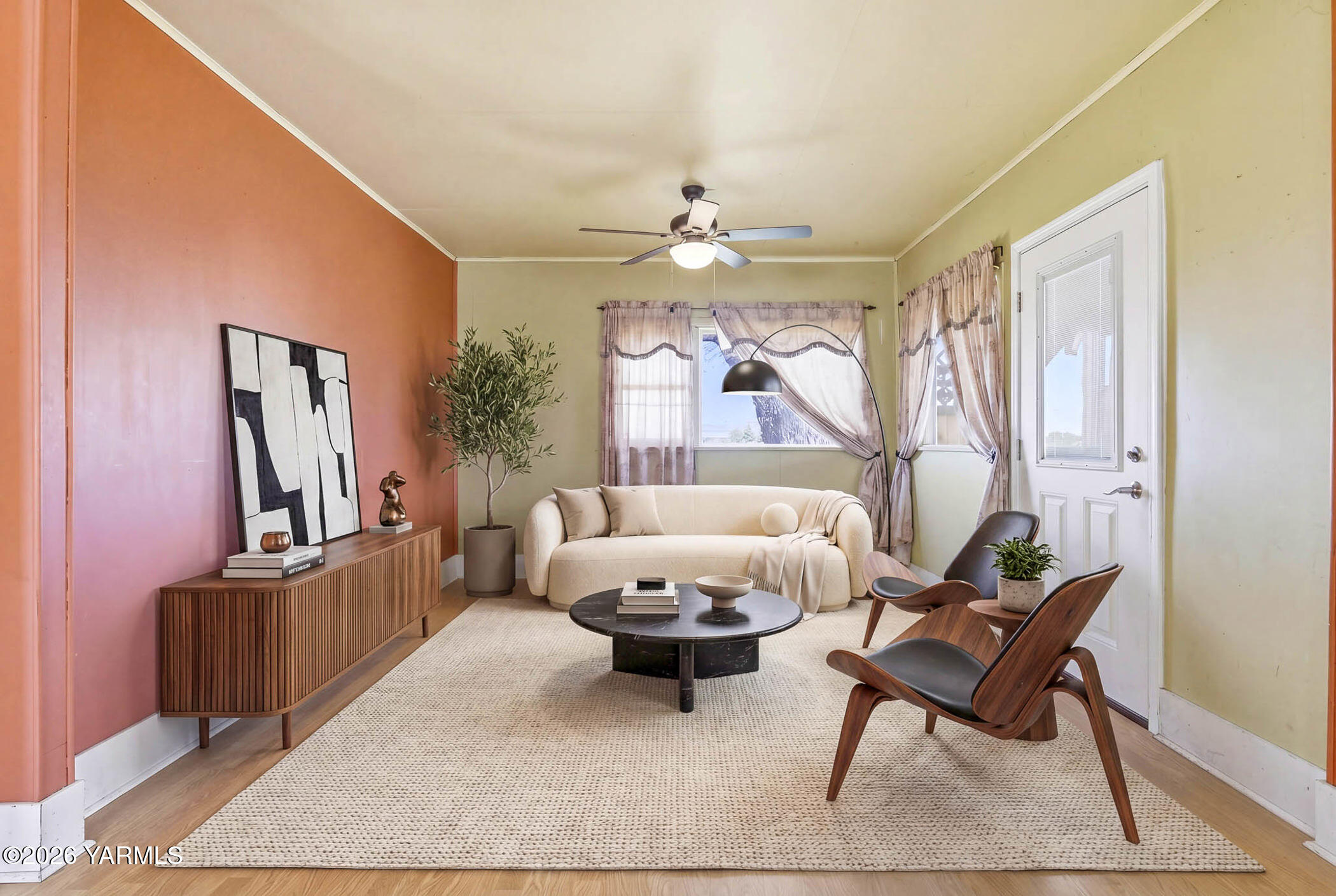 721 Blaine Road Granger, WA 98932 - Photo 6 of 45 a living room with furniture and a large window