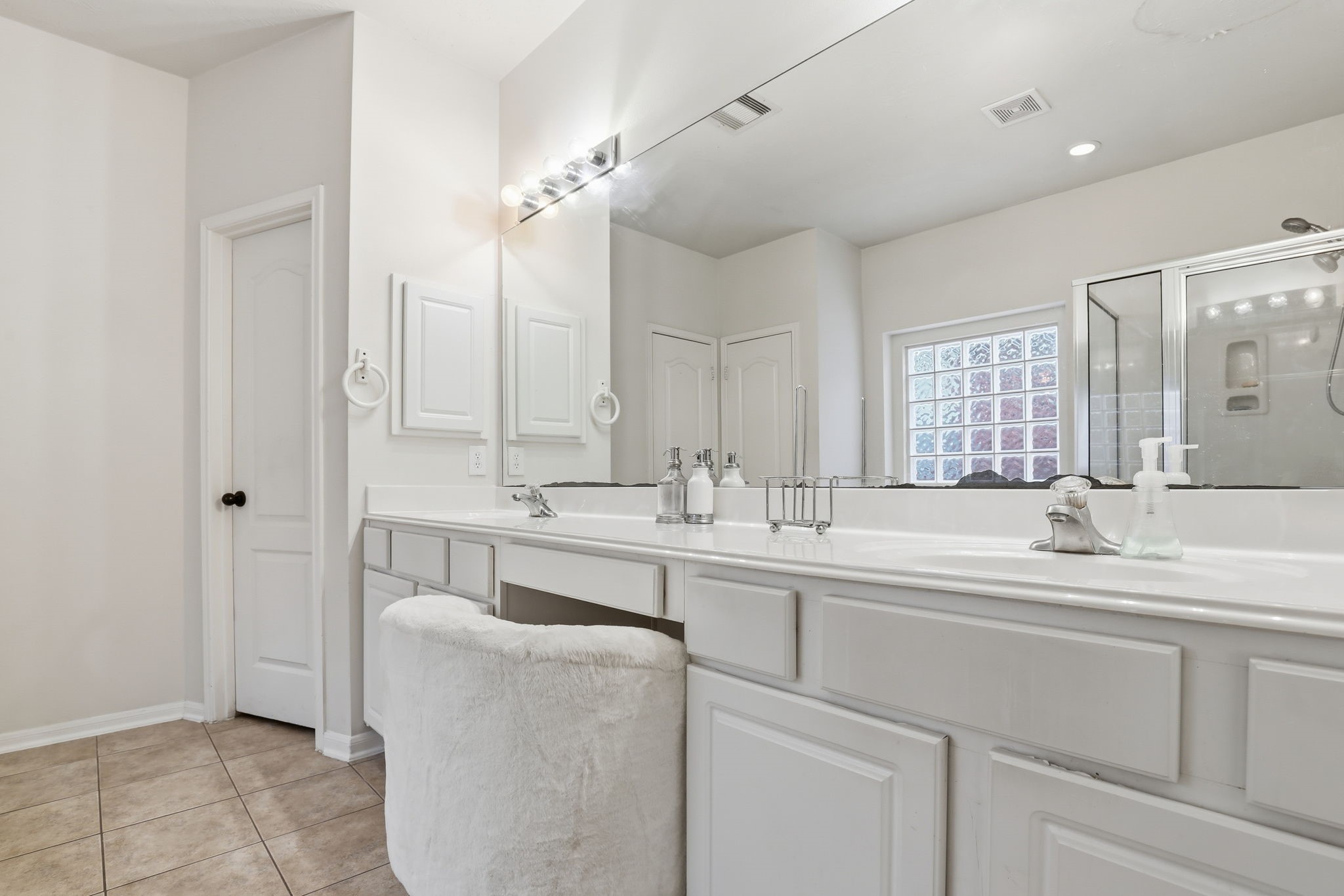 30615 Winlock Trails Drive Spring, TX 77386 - Photo 17 of 33 a bathroom with a sink double vanity and a mirror