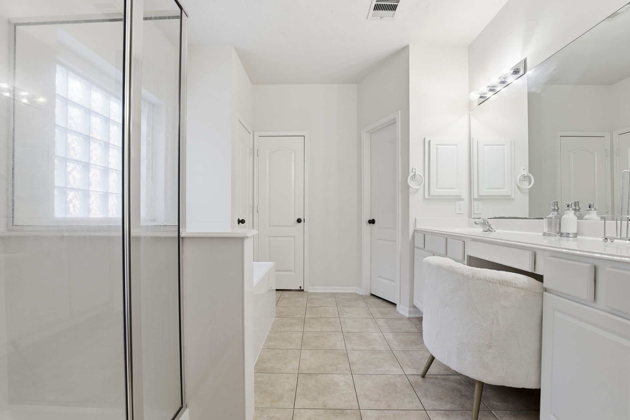 30615 Winlock Trails Drive Spring, TX 77386 - Photo 18 of 33 a bathroom with a sink a toilet and a mirror