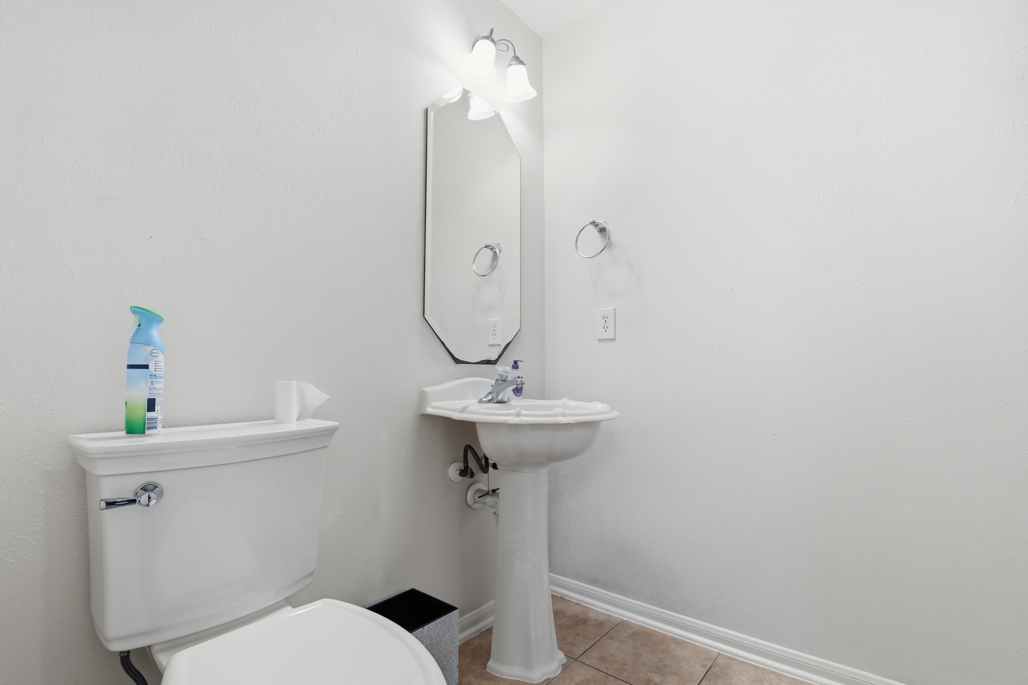 30615 Winlock Trails Drive Spring, TX 77386 - Photo 27 of 33 a bathroom with a sink a toilet and a mirror