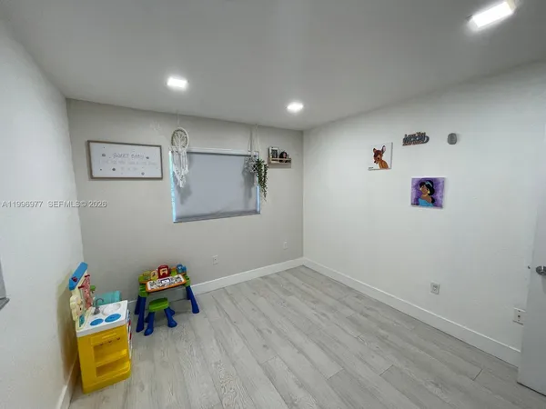 a view of storage and utility room with toys