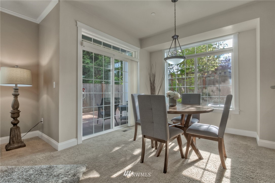 902 225th Place Southeast Bothell, WA 98021 - Photo 12 of 20 a dining room with furniture window and outside view
