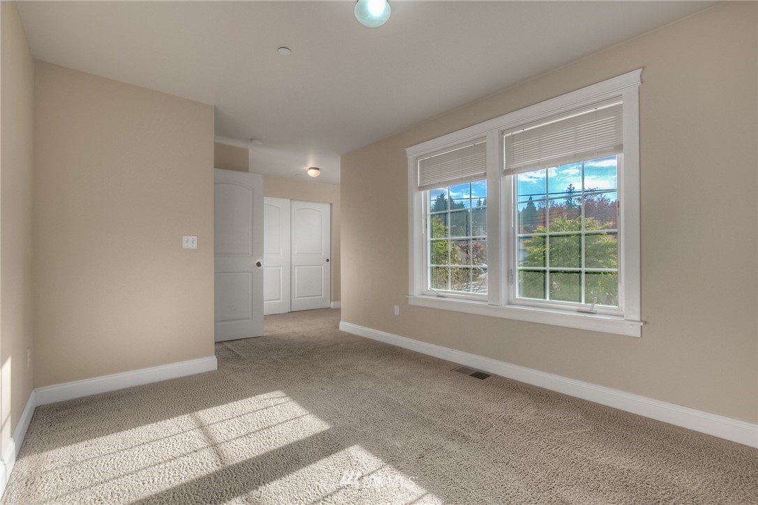 902 225th Place Southeast Bothell, WA 98021 - Photo 15 of 20 a view of an empty room with a window
