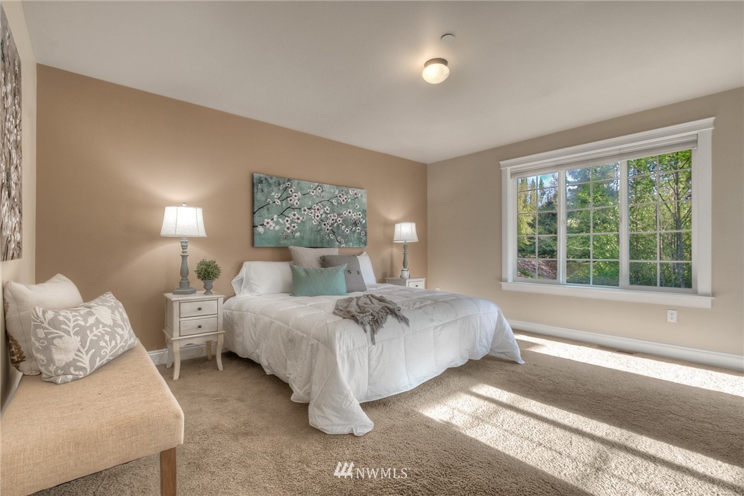 902 225th Place Southeast Bothell, WA 98021 - Photo 16 of 20 a bed room with two beds and a large window